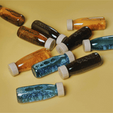 Bouteille sensorielle "Float" - Curcuma | PETIT BOUM