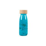 Bouteille sensorielle "Float" - Turquoise | PETIT BOUM